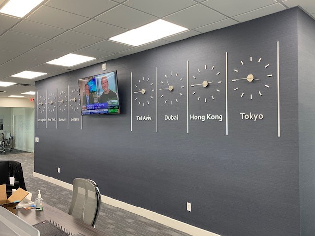 Clock wall at Crawford Lake Capital Management Office